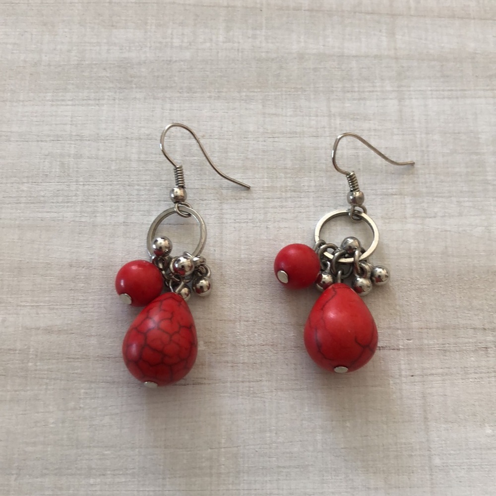 Red dangly earrings egg style